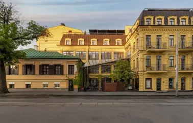 Bursa Hotel - minimalist hotel facade with dark tones and large, clean windows