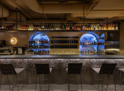 Bar area at Zmist in Kyiv with designer lighting and stylish furniture
