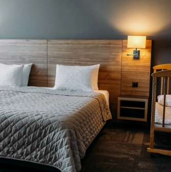 Double room in the Favor Park Hotel in Kyiv with wooden decoration