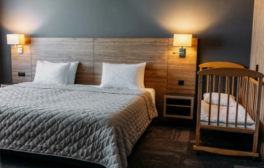 Double room in the Favor Park Hotel in Kyiv with wooden decoration