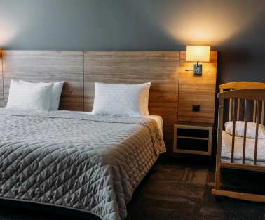 Double room in the Favor Park Hotel in Kyiv with wooden decoration