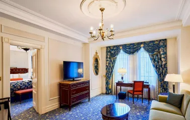Fairmont Grand - elegant hotel room with classic furniture and rich textiles