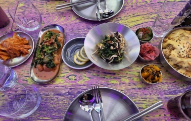 Street Kim - overhead view of authentic Korean dishes including kimchi and spicy rice