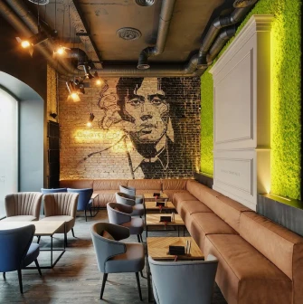 Interior of Par Bar in Kyiv with a portrait on the wall and a cozy atmosphere