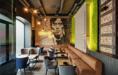 Interior of Par Bar in Kyiv with a portrait on the wall and a cozy atmosphere