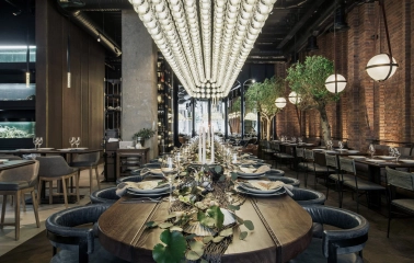 Catch Seafood Restaurant - long banquet table with leather chairs and elegant serving