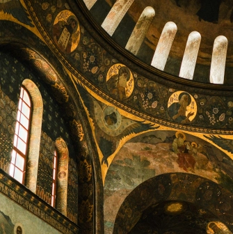 Kyiv Pechersk Lavra - interior of the Dormition Cathedral with historic frescoes and painted arches