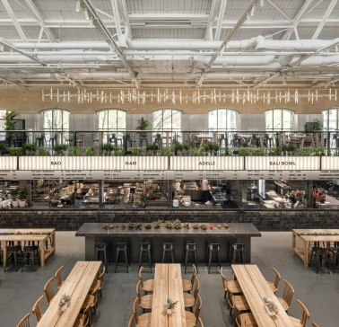 Kyiv Food Market main hall with wooden tables