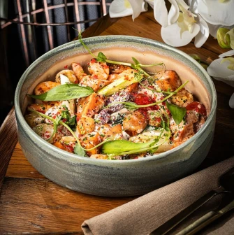 Seafood dish with greens at NAM restaurant
