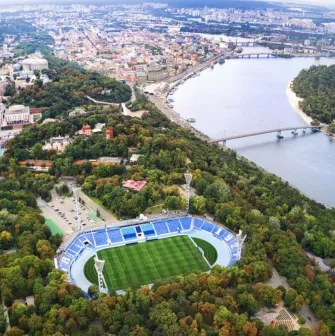Dynamo Stadium in Kyiv - panoramic view of Kyiv featuring the football stadium and the winding Dnipro river