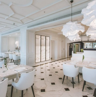 Fairmont Grand - sophisticated restaurant area with modern lighting and seating