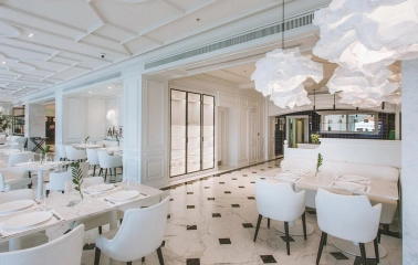 Fairmont Grand - sophisticated restaurant area with modern lighting and seating