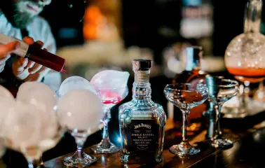 Alchemist Bar bartender crafting cocktails with smoke bubbles