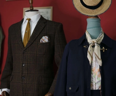 Mannequins in classic men's and women's clothing at the Levkovsky Vintage store in Kyiv