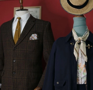 Mannequins in classic men's and women's clothing at the Levkovsky Vintage store in Kyiv