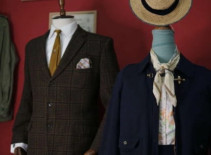 Mannequins in classic men's and women's clothing at the Levkovsky Vintage store in Kyiv