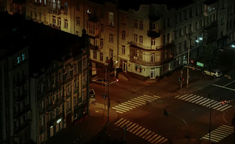 Empty street during curfew hours at night in Kyiv