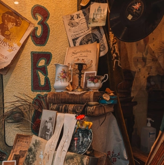 One Street Museum in Kyiv - detail of vintage books and porcelain display