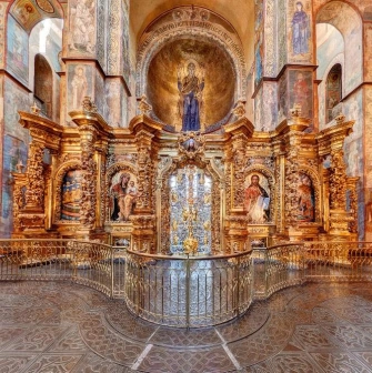 Gilded iconostasis and frescoes in the central altar of St. Sophia Cathedral in Kyiv