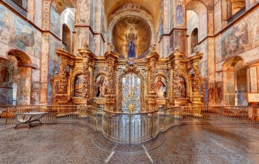 Gilded iconostasis and frescoes in the central altar of St. Sophia Cathedral in Kyiv
