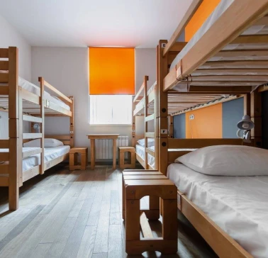Dream Hostel - room with four bunk beds and a window