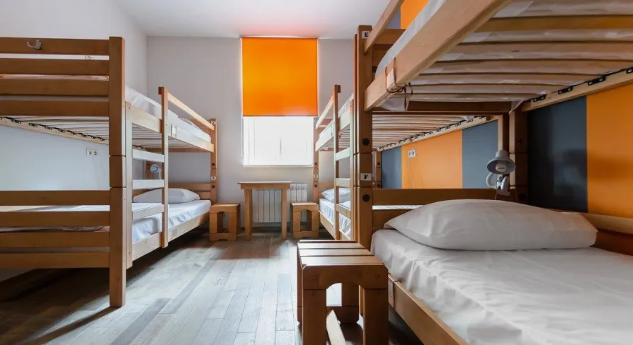 Dream Hostel - room with four bunk beds and a window