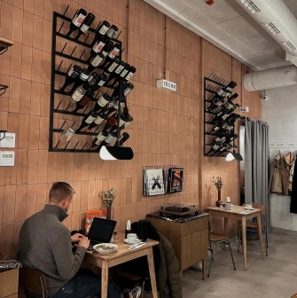Spelta - rustic interior featuring wooden tables chairs and a decorative bread display