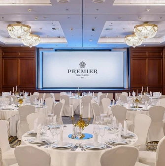 Premier Palace - formal restaurant dining area with elegant table settings