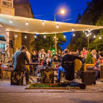 An evening outdoor concert on the terrace of Vagabond Cafe in Podil, Kyiv