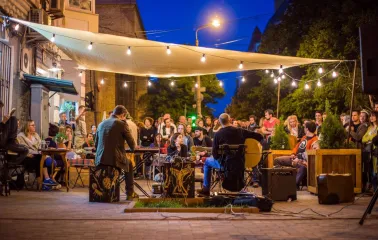 An evening outdoor concert on the terrace of Vagabond Cafe in Podil, Kyiv
