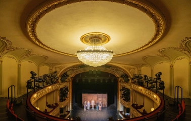 Teatr Franka in Kyiv - grand view from the upper circle looking down past a massive crystal chandelier onto the stage