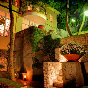 Terasa - wooden staircase leading to a rooftop terrace