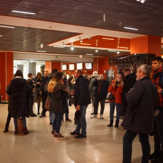 Visitors waiting in the spacious lobby of the Cinema Citi movie theater