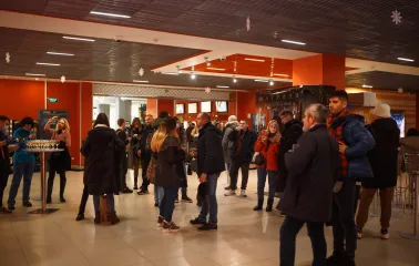 Visitors waiting in the spacious lobby of the Cinema Citi movie theater