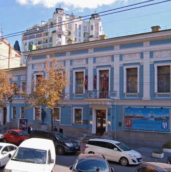 Kyivska Kartynna Halereia in Kyiv - elegant blue and white facade of the historic mansion