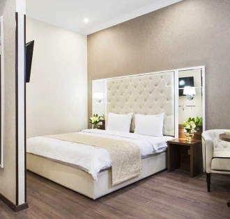 Фото спальні в готелі BonApart Hotel