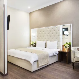 Фото спальні в готелі BonApart Hotel