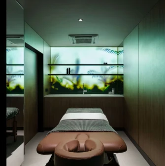 Radisson Blu - tranquil spa relaxation area with comfortable lounge bed