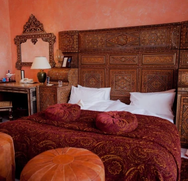 Opera Hotel - luxurious king-sized bed with rich fabrics