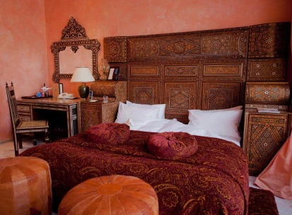 Opera Hotel - luxurious king-sized bed with rich fabrics