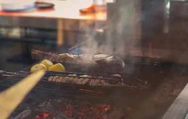 Mayak - steak and vegetables grilling over open fire