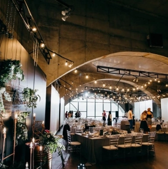 Banquet hall with arches and garlands in the ARTPRYCHAL art space in Kyiv