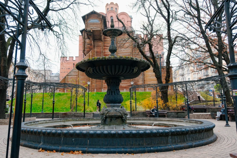 Thereman Fountain in Kyiv - iron fountain with the Golden Gate in the background