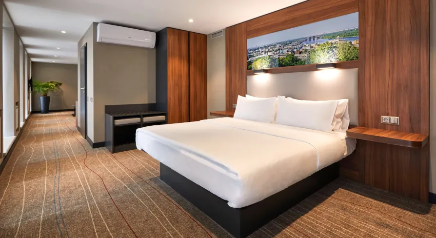 Bedroom in Sky Loft Hotel Kyiv by Rixwell