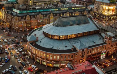 Night view of Bessarabian Market from above a busy intersection in the center of Kyiv