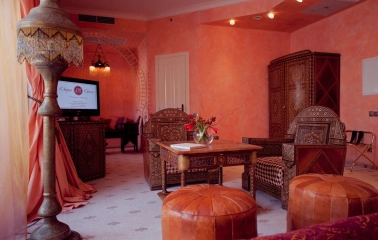 Luxury suite at Opera Hotel in Kyiv with red carpet and elegant interior