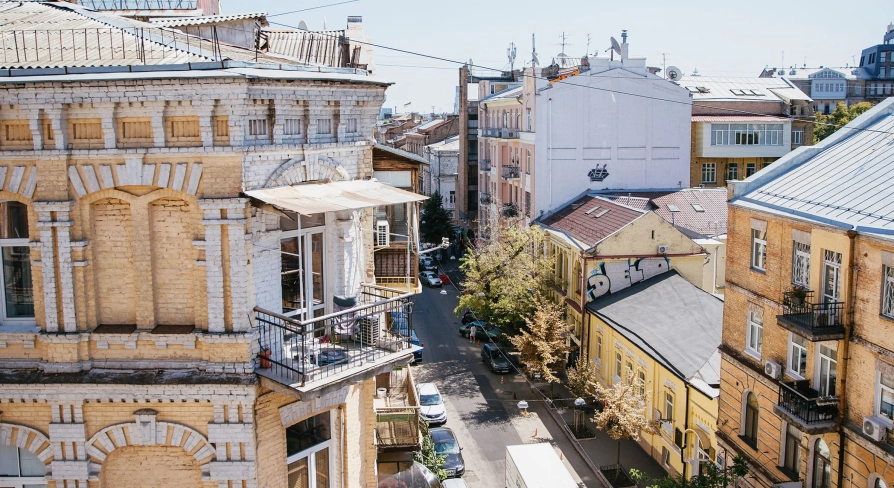 Vulytsia Reitarska in Kyiv - sunny view from a balcony overlooking a cozy street and old courtyards