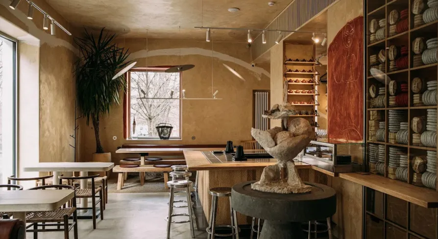 One Tea Tree - minimalist wooden interior with low seating, peaceful atmosphere