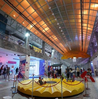 The main hall of the Museum of Science with visitors in Kyiv