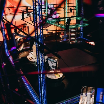 Museum of Mathematics Kuboid in Kyiv - complex view through metal truss structures and stage lighting revealing the high-tech atmosphere of the interactive museum